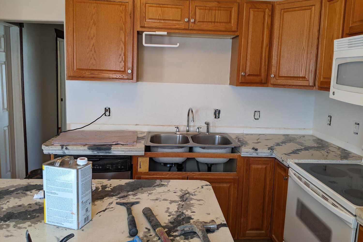 A Drab Rental Kitchen Gets a DIY Concrete Countertop Makeover